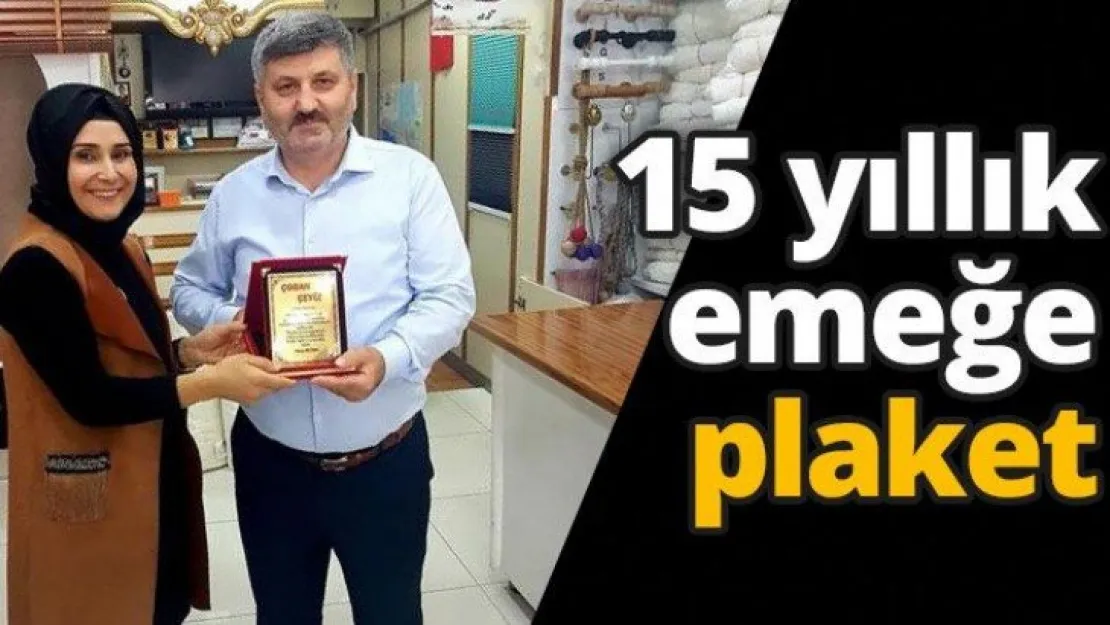 15 yıllık emeğe plaket