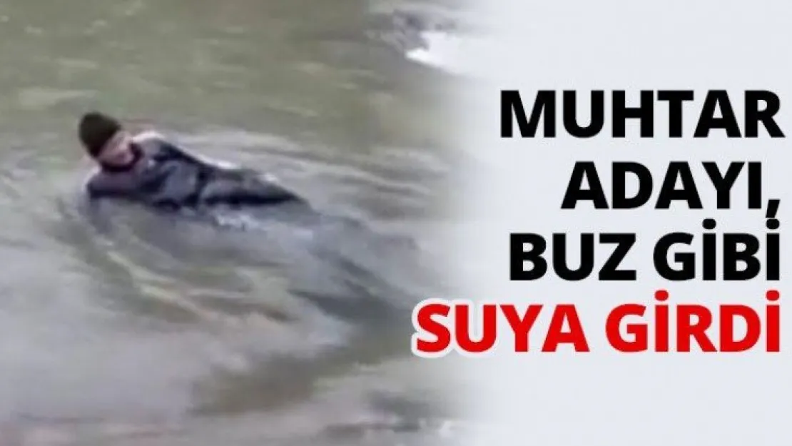 Muhtar adayı, buz gibi suya girdi