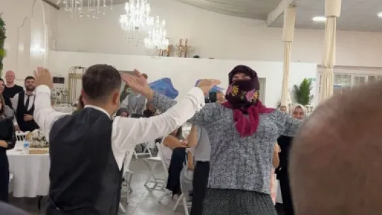 Kadın kılığında düğünü bastı