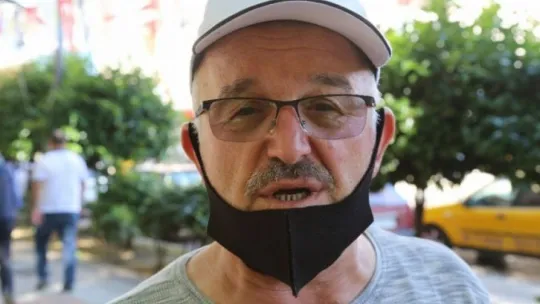 Kamerayı gören maskesini taktı