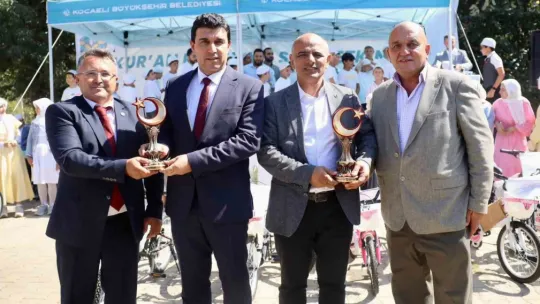 Kur'an kursunu bitiren öğrencilere bisiklet sürprizi